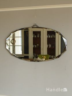 英国アンティークのおしゃれな鏡、オーバル型のカッティングミラー