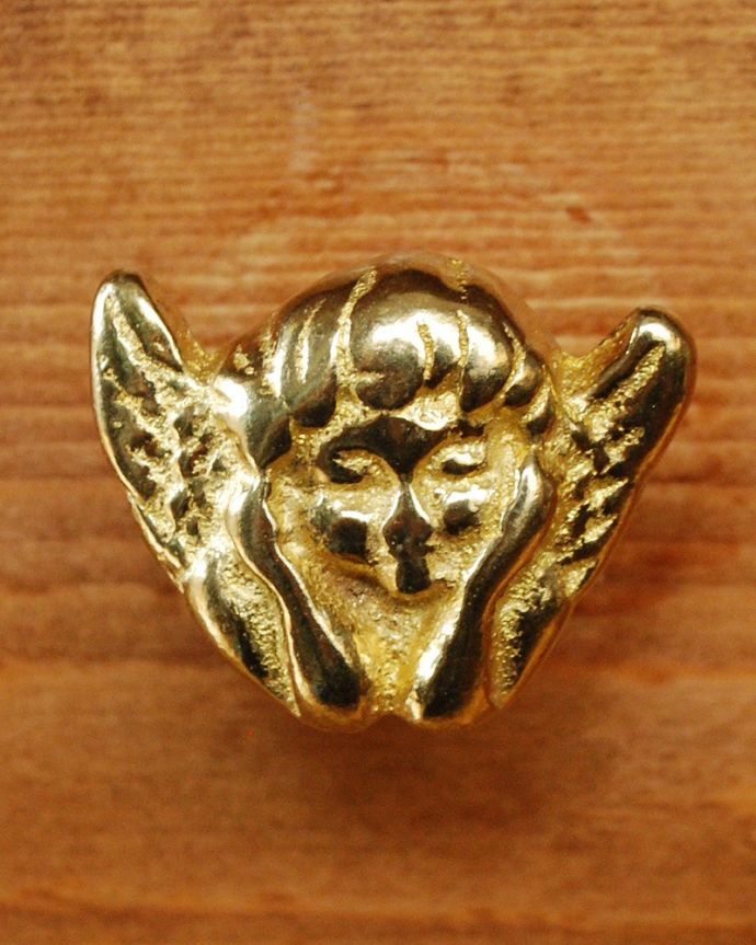 取っ手・ハンドル　住宅用パーツ　毎日使う持ち手をちょっとおしゃれに･･･真鍮製の取っ手（エンジェル）。遊び心あふれるオシャレなデザインパッと目を惹く可愛いデザイン。(u-534)