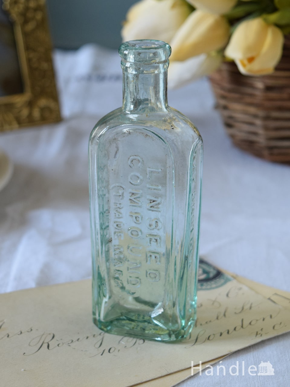 アンティークのガラスボトル、エンボス入りのガラス瓶(LINCEED COMPOUND)(m-5386-z)｜アンティーク雑貨