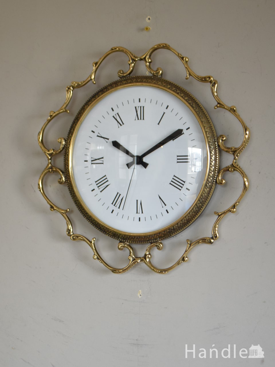 イタリアから届いたおしゃれな時計、真鍮製の装飾が豪華なウォール