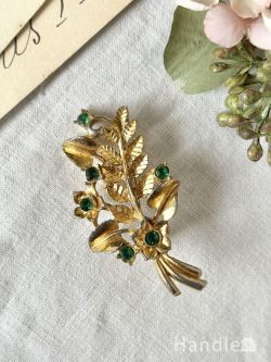 グリーン色のビーズが美しい英国ビンテージアクセサリー、ゴールドのお花が可愛いブローチ