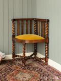 英国のアンティークのめずらしいコーナーチェア、ツイストレッグが豪華なオーク材の椅子